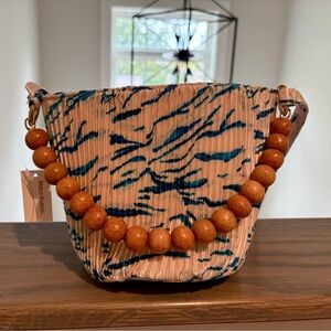 NWT Animal Print Pleated Bag with Wooden Beaded Strap. Removable straps.